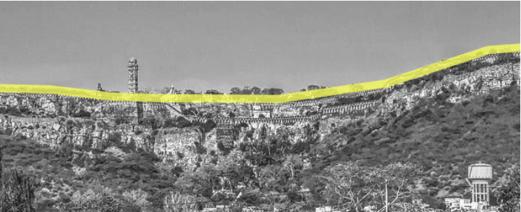 Black and white photograph of Chittorgarh fort with its skyline traced in yellow